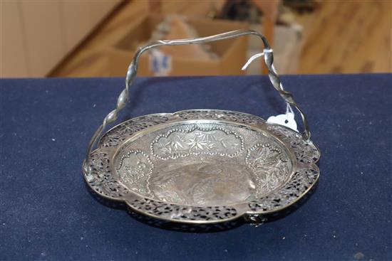 A Chinese white metal shallow basket with pierced border, diameter 18.5cm.